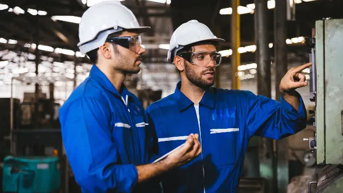 image of tow workers doing maintenance